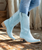 Heirloom quality boots with a core western influence. Meet Lexington in Powder Blue. The classic snip toe profile is embroidered to perfection with a twist on a traditional flame stitch.

Heel Height: 1.75"
Shaft Height: 13"
Calf Circumference: 14"
Ankle Circumference: 12"
Toe Shape: Snip
Signature Turquoise Soles
