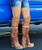 The Coleen boot is a must-have in the wardrobe of every loyal customer of El Vaquero brand. This double layered over-the-knee boot showcases the brand\'s signature handmade stitching on the instep, exquisite fringe detailing and an elegant lace-up back. Crafted with impeccable quality and attention to detail, the Coleen boot will enhance your look with sophistication and flair. The Abloom combination draws inspiration from the striking colours of the Australian outback, and features a mix of floral carvings blended with the new El Vaquero dip dyed color for an incredible fresh look.