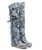 The Coleen boot is a must-have in the wardrobe of every loyal customer of El Vaquero brand. This double layered over-the-knee boot showcases the brand's signature handmade stitching on the instep, exquisite fringe detailing and an elegant lace-up back. Crafted with impeccable quality and attention to detail, the Coleen boot will enhance your look with sophistication and flair. Created in this new and amazing hand printed soft & subtle leather, a delicate balance of colors and tones that gives the item a lived-in look and an unprecedented vintage effect, typical of El Vaquero brand.

DETAILS

Hidden wedge 2 3/4" 
100% Cowhide leather 
Handmade Stitching
Hand-made dyed 
Metal details 100% nickel-free
Rubber sole
Made in Italy

Note - Due to the unique characteristics of the leather each pair will have it's own distinct markings and may differ from the photos pictured.