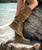 Mirea is one of the most stunning and original mid-rise El Vaquero boots. Featuring a 2 3/4" internal wedge, thick handmade stitching and a comfortable ankle strap, Mirea has a wonderful slouchy shaft with star-shaped leather details, studs and soft fringing. Washed with the renowned Silverstone treatment, a milestone of El Vaquero brand, that enhances every nuance of the leather in its most intense colors and makes each boot different and one of a kind.

Hidden wedge 2 3/4" 
Vintage Treatment
100% Calf suede
Handmade Stitching
Hand-inserted details
Metal details 100% nickel-free
Rubber sole
Made in Italy