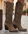 Our Vision moccasin-style boot features a plain over-the-knee bootleg, 2 3/4" hidden wedge, a cool ankle strap and the typical thick handmade stitching on the instep, distinctive feature of El Vaquero brand. Its simplicity gives the Vision boot a timeless elegance. Finished with the renowned Silverstone wash, a milestone of El Vaquero brand, that enhances every shade of leather, showcasing the most intense colors and making each boot unique in its kind.

Hidden wedge 2 3/4"
Vintage Treatment
100% Calf suede
Handmade Stitching
Hand-inserted details
Metal details 100% nickel-free
Rubber sole
Made in Italy