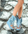 Amber is the perfect sandal for those who seek both style and comfort. A blend of boho boot and open summer sandal, it features a 3 1/4" wedge with a 1 3/4" front platform. With its extra-comfort insole, adjustable lace, and suede calf fringes and trims, it’s made for all-day wear. Finished with a leather lining for a touch of luxury in every step.

3 1/4" Wedge
Vintage finish
100% Suede Calf Leather
Nickel-free metallic details
Leather lining
Extra-comfort insole
Rubber outsole
Made in Italy
