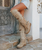 Our iconic Coleen boot, one of El Vaquero's most beloved styles, gets a bolder twist:

Coleen Studded. Featuring a 3-inch internal wedge, it's comfortable, flexible and entirely handcrafted.

The double fringed shaft, hand-applied studs, hidden lace and back lacing provide the perfect fit.

Wear it high, upside down or scrunched up the leg. Only 20 pieces to celebrate 50 years of El Vaquero.

Internal wedge 7 cm
Vintage Treatment
100% Calf Suede
Handcrafted stitching
Hand-applied studs
Rubber sole
Made in Italy