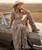 DESCRIPTION
The Coleen boot is a must-have in the wardrobe of every El Vaquero brand aficionado.

This double-shaft, over-the-knee boot features signature artisan stitching, beautiful side fringes, and an elegant lace-up back.

Crafted from this beautiful material that blends the wild charm of leopard print with the elegance of marble patterns, adding a touch of exotic elegance to any design.

PRODUCT DETAILS
Internal wedge 2 3/4"
Vintage Treatment
100% Calf Suede
Handcrafted stitching
100% nickel-free metal details
Rubber sole