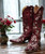 Bloom with every step in these breathtaking Old Gringo boots. Crafted from rich red leather, this statement style is brought to life with vibrant white floral embroidery inspired by delicate cherry blossoms. The bold contrast of color makes these boots a true standout, blending western tradition with feminine artistry.
