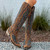 Three Words: To. Die. For. ?
We are head over heels for these stunning Liberty Black Boots! Crafted with richly distressed canela beige leather, they feature azul blue inlays and a chic snip toe that blends timeless Western charm with modern, fashion-forward flair.

The 17" tall silhouette elongates the leg beautifully, while the soft vintage-treated leather gives them that perfect broken-in feel from the very first step. Finished with an easy walking heel, these boots are the kind you’ll wear year-round — pair them with dresses, denim, festival fits, or date-night looks for a show-stopping style moment.

These beauties aren’t just boots… they’re a whole vibe. Get ready for compliments.

Measurements:
Shaft Height: 17"

Shaft Opening: 14.5" circumference

Heel Height: 1 3/4"

Toe: SNIP

Width: Standard