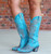 The turquoise leather on this exclusive Nicolette colorway from Old Gringo is absolutely D.I.V.I.N.E. Every detail is breathtaking—from the vivid floral embroidery to the taller, ultra-chic Western silhouette.

Originally dreamed up by Old Gringo’s own Jenn Foster as a custom pair, this stunning design was too good not to share. And now, you can experience the magic yourself.

Fall head over heels for all 15 inches of the Old Gringo Nicolette Turquoise Boots—an eye-catching, must-have style you won’t find just anywhere.

Measurements: