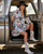 Not your everyday boot — this one is a statement. The Liberty & Justice Boot from Double D Ranch is a true work of wearable art, designed for those who love bold storytelling stitched into every detail. Crafted from rich cowhide leather in a crackled taupe finish, this boot blends rugged Western spirit with iconic Americana.

From the intricate patchwork and studded accents to the beautifully detailed native medallion, harness, embroidery, and braiding, every element has been thoughtfully placed. The crackled leather showcases striking eagle imprints, while the powerful word “Freedom” stretches across the left boot — a detail that elevates this design from standout to unforgettable.

Finished with signature Double D Ranch touches like the Indian ’89 patch, patriotic symbols, and DDD insignia, this boot reflects craftsmanship, heritage, and fearless style. Whether you’re dressing it up or letting it steal the show with denim, the Liberty & Justice Boot is guaranteed to turn heads and spark conversation.

Details:

Color: Crackled Taupe

Leather: Cowhide

Toe: 4Long

Heel: 9964

Shaft Height: 11"

Features: Patchwork, studs, native medallion, harness, embroidery, braiding, eagle imprints, “Freedom” detail

A bold expression of Western artistry and American spirit — this is one boot you’ll never stop discovering.