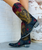 Gotta love the colors on the Old Gringo Letty Boots L1115-8. The marine blue and military green boot shaft mixes beautifully with the vesuvio red leather accents. The Letty boot was made for ladies looking to make a bold fashion forward statement. The floral designs on the toe are beautiful and the heart shaped embroidery on either side of the boot shaft gives it a sassy finish.