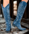 Boots are made for walking AND looking amazing, and the Old Gringo Mayra Boots are SO on trend. These aren't just cowgirl boots; these are fabulous fashion boots. Handcrafted in Leon, Mexico with gorgeous Azul Blue soft & subtle leather and accented with cream embroidery. We love the tall, 18" silhouette and pointed snip toe of the Mayra Boots. Whether you rock them all day or for date night, we know you will look AMAZING and turning heads in the Mayra Azul Blue Cowgirl Boots!


* Shaft Height - 18"
* Shaft Opening - 13.5" circum.
* Heel Height - 1 & 3/4" 
* Toe - Snip
* Standard Width