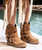 The Arya boot has defined the recent history of El Vaquero becoming the leading character of its tale of freedom and wildness. Featuring our signature handmade stitching, side fringing and hardware embellishments, the Arya boots will be with you on the most adventurous journeys. Washed with the renowned Silverstone treatment, In Mou color.