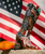 250 YEARS. 250 PAIRS. ONE LEGACY. ??

Inspired by 250 years of history, this boot stands as a symbol of freedom, courage, and unity—the very foundation of our journey. Every detail reflects who we are and where we come from, honoring a legacy defined by bold spirit and unwavering resilience.

This one-of-a-kind cowboy boot blends classic Western heritage with refined elegance. Crafted from premium cowhide, each pair is individually hand-tooled and hand-painted, ensuring no two are ever alike.

Featuring a striking 13" shaft and a perfectly balanced 2" heel, it creates a silhouette that is both powerful and timeless—an artisan masterpiece rooted in authenticity, craftsmanship, and enduring American spirit.