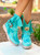 With her bohemian soul, Arya is designed to break the most artistic hearts. 

The vintage look of Arya is achieved thanks to our special treatment that allows you to create a unique style for every pair made. 

Available in this beautiful Marine Turquoise leather that makes the boot suitable for any outfit.