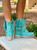 With her bohemian soul, Arya is designed to break the most artistic hearts. 

The vintage look of Arya is achieved thanks to our special treatment that allows you to create a unique style for every pair made. 

Available in this beautiful Marine Turquoise leather that makes the boot suitable for any outfit.