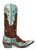 This image captures a striking **modern boho-western look** with a blend of romantic femininity and rugged Southwestern style.

### Outfit Description

The model is wearing a **black silk slip dress** with delicate **black lace trim** along the neckline and asymmetrical hem. The dress features a flowing high-low silhouette that moves beautifully and gives it an effortless, free-spirited feel.

Layered around the waist is a **wide vintage-style concho belt** with oversized silver conchos, adding a classic Southwestern touch and defining the waist.

She pairs the dress with **black mid-calf western boots** featuring:

* Fringe detailing along the shaft
* Decorative ankle straps with tassels
* A slightly distressed suede or nubuck finish
* A low western heel
* A pointed toe

Her accessories complete the bohemian aesthetic with multiple **stacked sterling silver and turquoise cuffs and bracelets**, along with turquoise rings that add color and authentic Western character.

A **wide-brim black felt rancher hat** frames her long, tousled blonde hair, giving the look a relaxed yet sophisticated finish.

### Styling Aesthetic

This outfit perfectly blends:

* ? Modern Western
* ? Desert Bohemian
* ✨ Festival Luxe
* ? Romantic Gothic Western
* ? Free-Spirited Cowgirl

It's reminiscent of styling from brands like:

* Chasing Unicorns
* El Vaquero
* Old Gringo
* Double D Ranch
* Magnolia Pearl

### Setting

The model is photographed in a **desert landscape** with red sand, dry grasses, and scattered trees beneath a soft blue sky. The natural backdrop complements the earthy, Southwestern mood of the outfit and reinforces its adventurous, wanderlust-inspired feel.

### Product Description

**Take the Long Road Home Silk Lace Slip Dress – Black**

Gracefully feminine with a touch of Western soul, this flowing black silk slip dress is designed for the woman who loves effortless elegance. Delicate lace accents frame the neckline and cascading high-low hem, creating beautiful movement with every step. Styled with a vintage concho belt, turquoise jewelry, and statement cowboy boots, it's the perfect piece for everything from concerts and festivals to date nights and special occasions.

Whether you're strolling through the desert, dancing under the stars, or heading out for an evening downtown, this timeless dress captures the essence of modern boho luxury—romantic, confident, and undeniably unforgettable. ??
