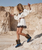 Edith is El Vaquero’s ankle boot with a bold, show-stopping presence, designed for those who love statement volumes and eye-catching details. The style is crafted in soft, washed fur that creates a strong yet sophisticated impact. Side fringe, visible stitching and a strap with buckle strike a balance between character and refinement. The internal wedge ensures comfort and support, making Edith perfect to wear for long hours without giving up the wow effect.
 

Internal Wedge 7 cm (approx 2.75 inches)
Vintage treatment
Washed fur
Handcrafted stitching
100% nickel-free metal details
Rubber sole
Made in Italy