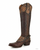 ## Old Gringo Aster Brass Hand-Tooled Tall Western Boot

Bold, elegant, and unmistakably Old Gringo, the **Aster Brass** is a stunning showcase of artisan craftsmanship. Rich brass leather is beautifully contrasted with hand-tooled tan leather overlays featuring intricate floral patterns, creating a timeless Western design with exceptional depth and character. Every detail is carefully handcrafted, making this boot a true statement piece that will turn heads wherever you go.

The dramatic **18-inch knee-high shaft** offers a flattering silhouette, while the signature **Sintino heel** and **Sintino-4 toe** provide a refined Western profile that's both stylish and comfortable. Whether paired with your favorite skinny jeans, a flowing dress, or layered with boho-inspired pieces, the Aster Brass effortlessly transitions from everyday wear to special occasions.

Handcrafted in Mexico using premium leathers and traditional techniques, each pair reflects the quality and individuality that has made Old Gringo one of the most sought-after names in luxury Western footwear.

### Details

* Handcrafted in Mexico
* Premium brass leather construction
* Hand-tooled tan leather overlays with floral detailing
* Intricate artisan tooling throughout
* Decorative buckle harness accents
* Approximately 18-inch shaft height
* Sintino heel
* Sintino-4 toe
* Leather outsole
* Signature Old Gringo craftsmanship

**Please Note:** Every pair of Old Gringo boots is individually handcrafted using premium natural leathers. Variations in color, tooling, leather grain, distressing, and hand-finishing are part of the authentic character of each pair, ensuring every pair is truly one of a kind.
