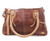 Rockababy is a compact take on the beloved Rockaway silhouette, thoughtfully scaled for everyday ease. Crafted from full-grain, vegetable-tanned leather, it offers a streamlined interior sized for everyday essentials. Padded shoulder straps provide comfortable carry, while an adjustable crossbody strap adds versatility throughout the day. Finished with a secure zip-top closure and an exterior back pocket, Rockababy delivers handcrafted character in a silhouette that feels effortless and distinctly timeless.