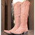 Boots are made for walking AND looking amazing, and the Old Gringo Mayra Boots are SO on trend. These aren't just cowgirl boots; these are fabulous fashion boots. Handcrafted in Leon, Mexico with gorgeous Soft Pink brushed leather and accented with cream embroidery. We love the tall, 18" silhouette and pointed snip toe of the Mayra Boots. Whether you rock them for Spring & Summer or for a fabulous date night, we know you will look AMAZING and turning heads in the Mayra Soft Pink Boots!


* Shaft Height - 18"
* Shaft Opening - 13.5" circum.
* Heel Height - 1 & 3/4" 
* Toe - Snip
* Standard Width
