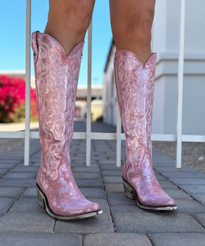 Immerse yourself in western style with our ALLIE Rosa Cracked Leather boots. These elegant boots not only provide a touch of glamour but also stand out with subtle embroidery on the shaft and toe, adding a touch of sophistication and authenticity to your outfit.

Measurements:

Shaft Height - 17"
Heel Height - 2" 
Toe - Round Pointed
Standard Width