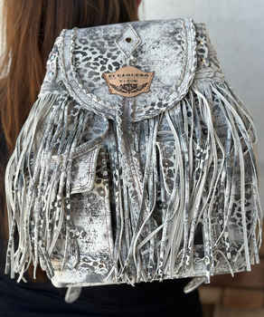 Mermaid is our incredible backpack that is a smash hit featuring a flap closure, dramatic fringe, two outer pockets, silver findings and adjustable shoulder straps, our backpack is the perfect combination of style and comfort. Fashioned out of this soft subtle leather with our feature marbling technique which creates amazing color fluctuations and shades on the leather, defining the unique character of our handbags.

 

Height 13 inches
Width 8 inches
Leather shoulder straps
Magnetic button closure
Metal details 100% nickel-free
Internal pouch with zip
100% Leather
Made in Italy

Note - Due to the unique characteristics of the leather each pair will have it's own distinct markings and may differ from the photos pictured.