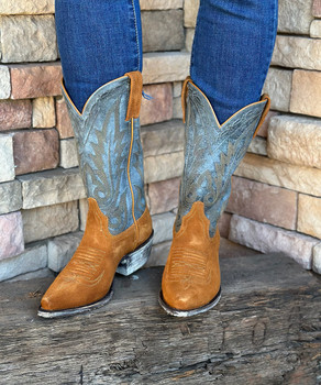 This Liberty Black style is HOT HOT HOT!!! With features like the eye catching distressed denim blue leather, amber brushed leather on the footbed and subtle stitch details any serious cowgirl boot collector will want to make sure these are a part of that collection. Grab your pair before they are gone forever!

 

Measurements:

Shaft Height - 12"
Heel Height - 1 3/4" WALKING HEEL 
Toe - Snip
Standard Width