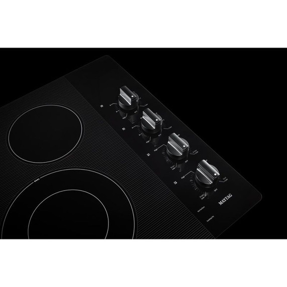 Maytag® 30-Inch Electric Cooktop with Reversible Grill and Griddle MEC8830HB