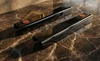 C4 Corvette Door Sill Covers - Anodized Black - Pair on Showroom Table
