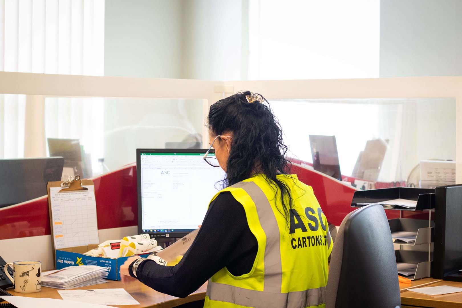 employee working behind a desk