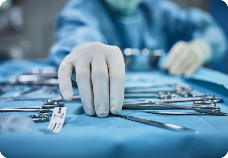 Surgeon with surgical supplies