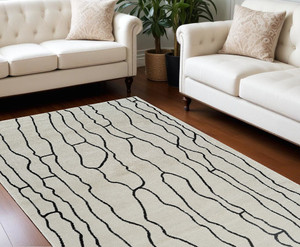 8' X 11' Cream and Black Abstract Distressed Area Rug N270-559035