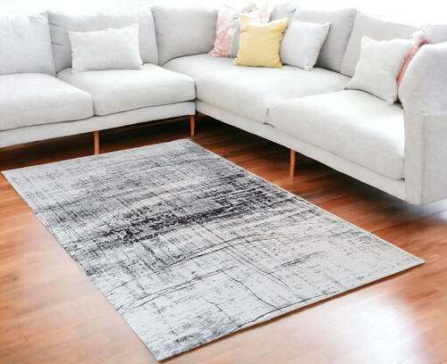 5' X 7' Black and White Abstract Non Skid Area Rug N270-548549