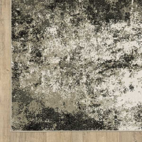 5' X 7' Charcoal Grey And Beige Abstract Power Loom Stain Resistant Area Rug N270-509826