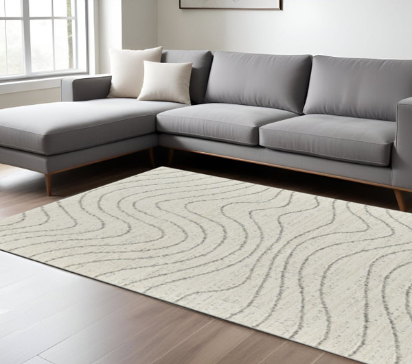 8' X 11' Cream and Beige Abstract Area Rug N270-570066