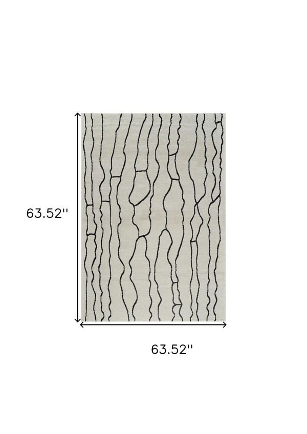 5' X 8' Cream and Black Abstract Distressed Area Rug N270-559033