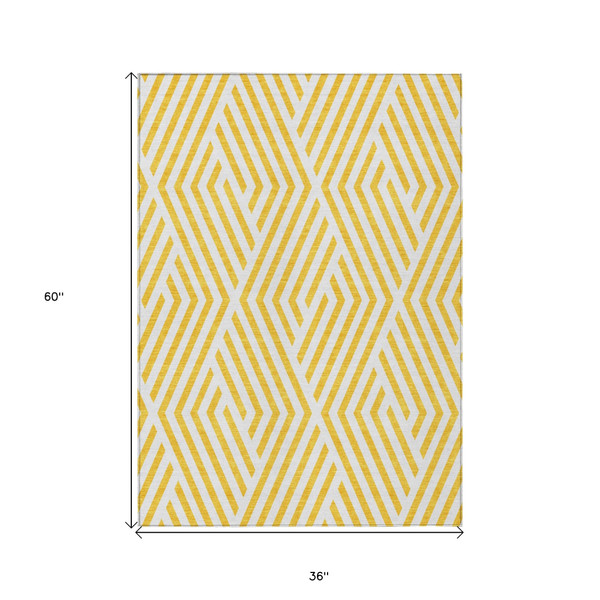 3' X 5' Gold and White Geometric Washable Non Skid Indoor Outdoor Area Rug N270-562392
