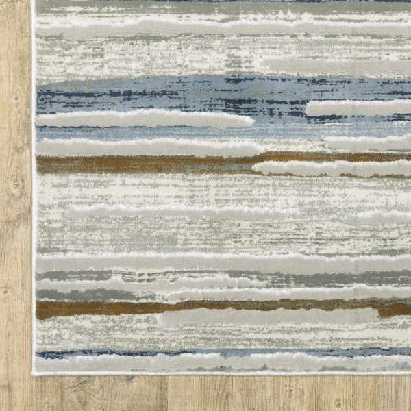 3' X 5' Grey Blue Ivory Brown Beige And Navy Abstract Power Loom Stain Resistant Area Rug N270-508784