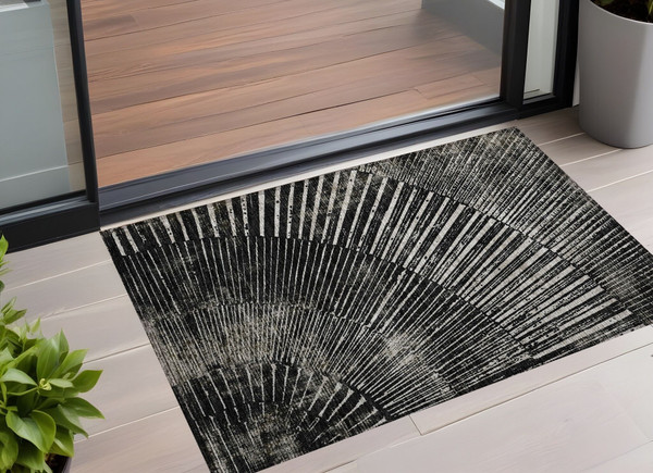2' X 3' Black and Ivory Abstract Washable Non Skid Indoor Outdoor Area Rug N270-561948