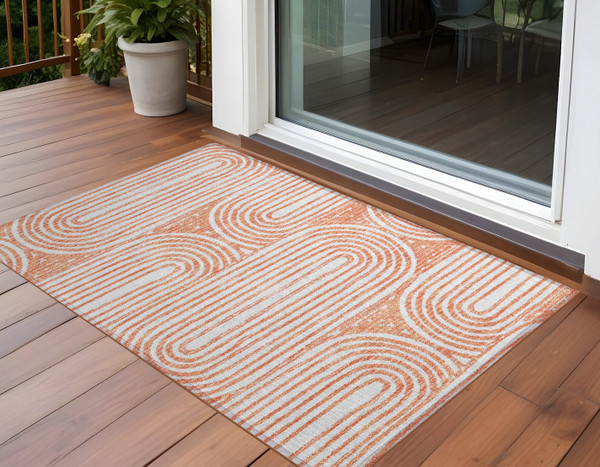 3' X 5' Orange and Ivory Abstract Washable Non Skid Indoor Outdoor Area Rug N270-561861