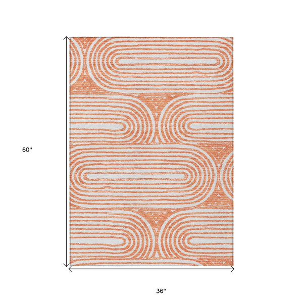 3' X 5' Orange and Ivory Abstract Washable Non Skid Indoor Outdoor Area Rug N270-561861