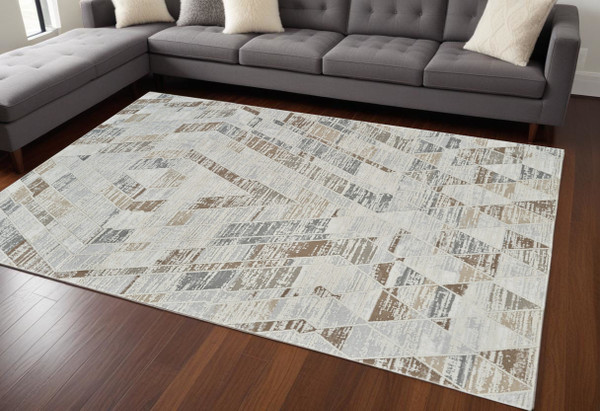 7' X 10' Beige and Brown Abstract Distressed Area Rug N270-558854