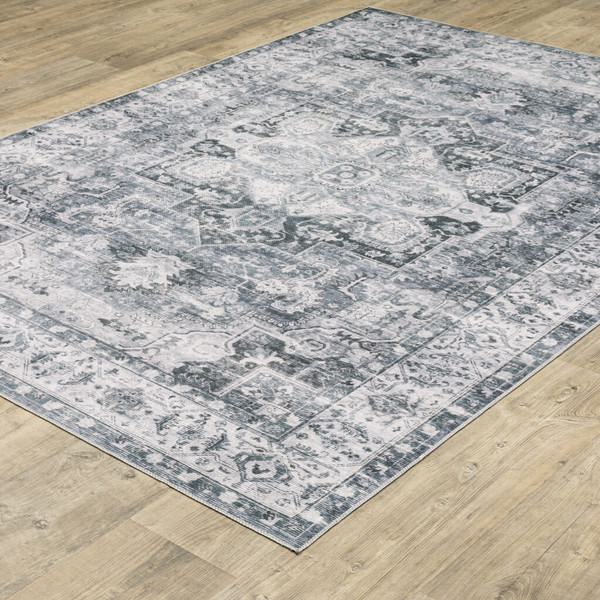5' X 7' Navy Blue Ivory And Grey Oriental Printed Stain Resistant Non Skid Area Rug N270-510374