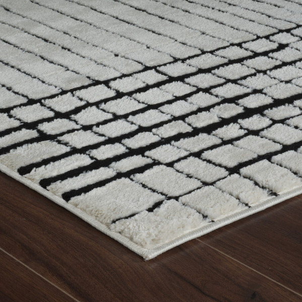 5' X 8' Cream and Black Abstract Distressed Area Rug N270-559021