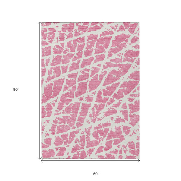5' X 8' Pink and Ivory Abstract Washable Non Skid Indoor Outdoor Area Rug N270-559302