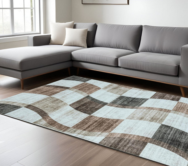 7' X 10' Beige Brown and Gray Checkered Area Rug N270-570041
