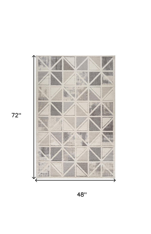 4' X 6' Gray and Cream Geometric Distressed Area Rug N270-558479