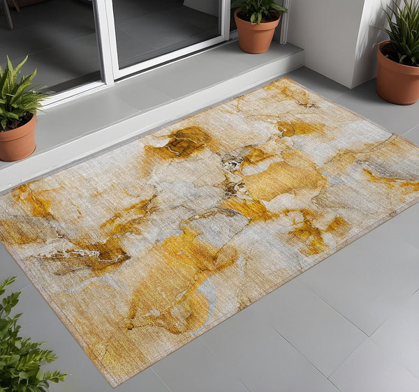 2' X 3' Orange and Ivory Abstract Washable Indoor Outdoor Area Rug N270-560654