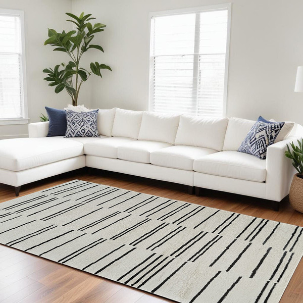 8' X 11' Cream and Black Abstract Distressed Area Rug N270-559031