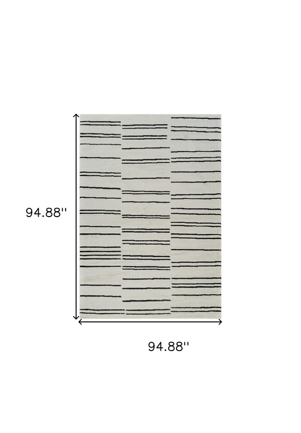 8' X 11' Cream and Black Abstract Distressed Area Rug N270-559031