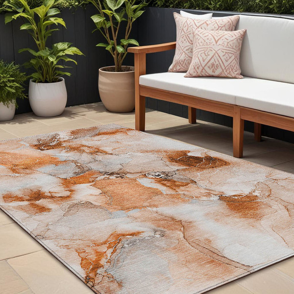 9' X 12' Orange and Ivory Abstract Washable Non Skid Indoor Outdoor Area Rug N270-560670